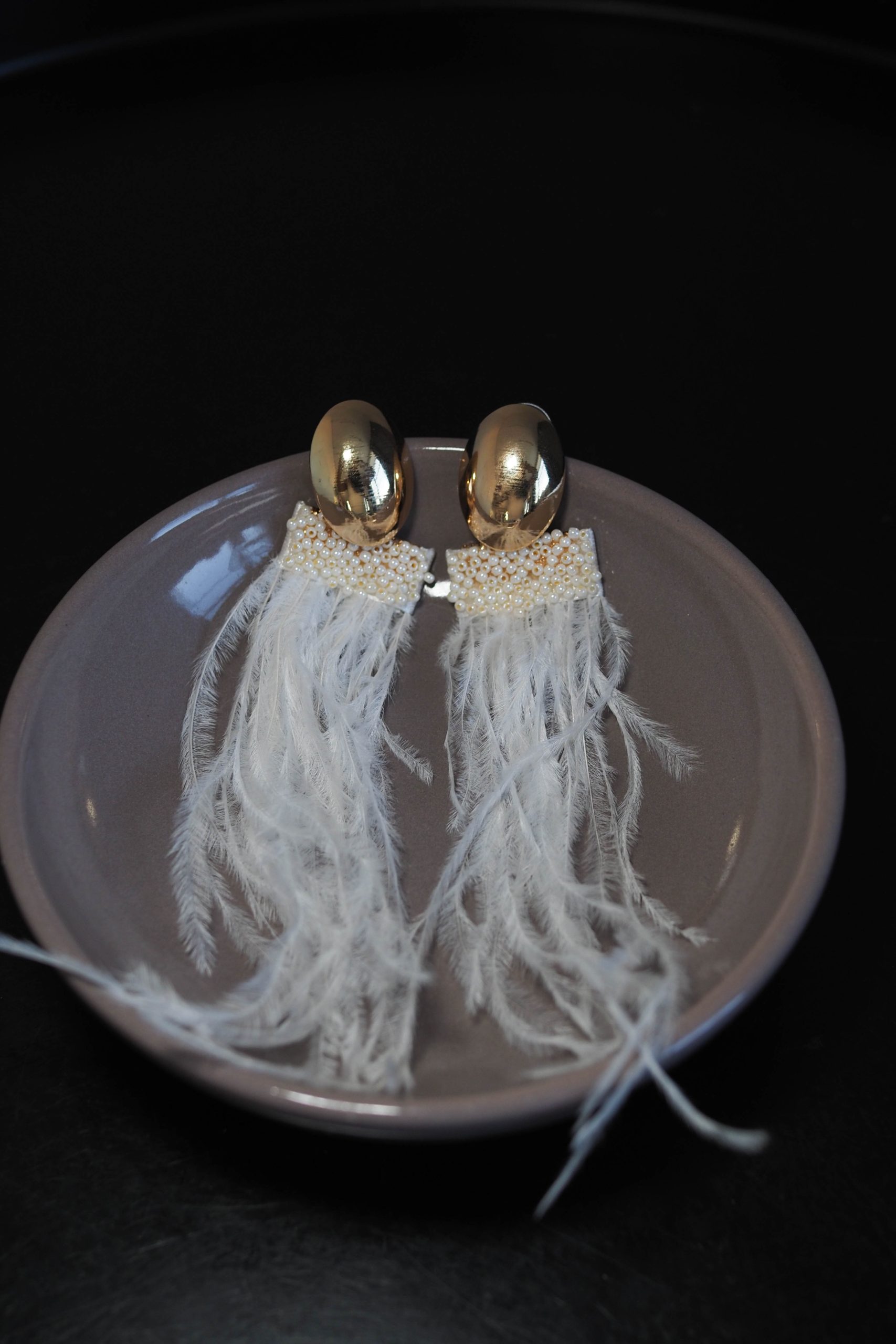 Серьги с перьями